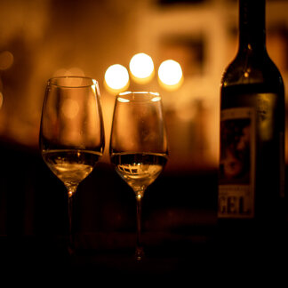 Wine glasses in the Hotel Lercher wine cellar. Wine glasses in the Hotel Lercher wine cellar.