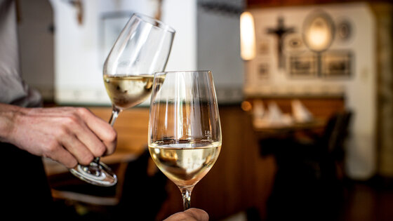 Toast with wine at the Murauer Gasthof Hotel Lercher. Toast with wine at the Murauer Gasthof Hotel Lercher.