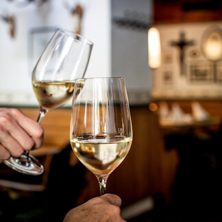 Toast with wine at the Murauer Gasthof Hotel Lercher. Toast with wine at the Murauer Gasthof Hotel Lercher.