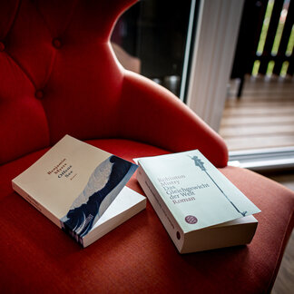 Books on a coffee table in the Hotel Lercher.