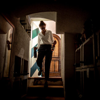 Anna Lercher in the wine cellar of the Gasthof Hotel Lercher in Murau. Anna Lercher in the wine cellar of the Gasthof Hotel Lercher in Murau.