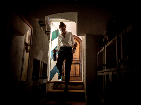 Anna Lercher in the wine cellar of the Gasthof Hotel Lercher in Murau.