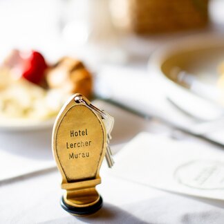 Room key on the breakfast table. Room key on the breakfast table.