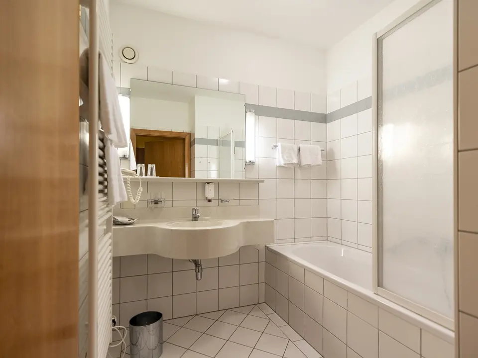 Bathroom in hotel Family room 4* in Hotel Lercher